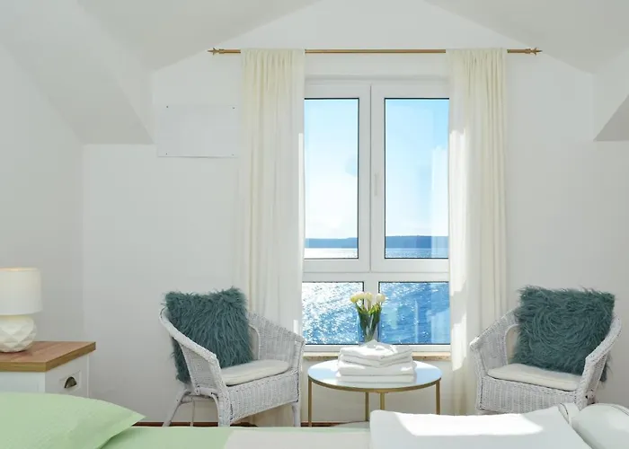 Wisibada Трогір